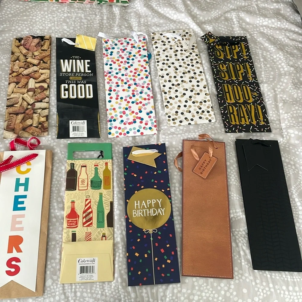 Set of 10 miscellaneous wine gift bags. Great for the upcoming holidays
